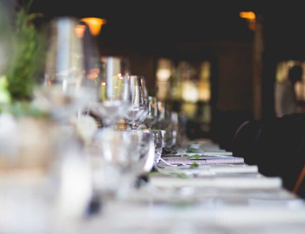 glasses of wine in a row on a table